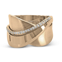 18k rose and white gold combine in this modern, overlapping band, accented by .12 ctw of white round brilliant diamonds.