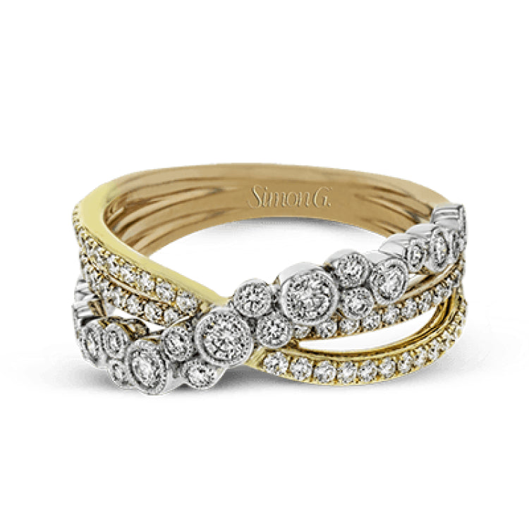 This modern tri-tone 18k gold ring features an overlapping design containing .73 ctw of shining white round brilliant diamonds.