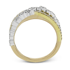 This modern tri-tone 18k gold ring features an overlapping design containing .73 ctw of shining white round brilliant diamonds.