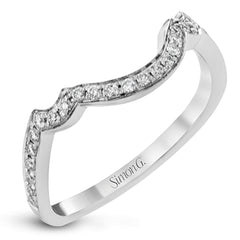 Dramatic yet romantic, this exquisite white gold engagement ring features .61 ctw of round cut white diamonds highlighted by .58 ctw of pear shaped diamonds in delicate floral motifs.