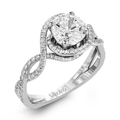 Classic with a modern twist, this white gold engagement ring features .50 ctw of sparkling white diamonds in a dramatic openwork design.