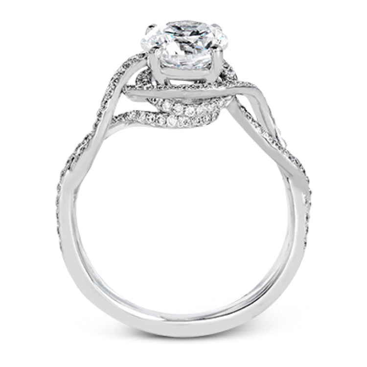 Classic with a modern twist, this white gold engagement ring features .50 ctw of sparkling white diamonds in a dramatic openwork design.