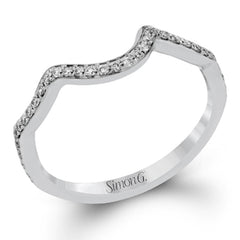 Classic with a modern twist, this white gold engagement ring features .50 ctw of sparkling white diamonds in a dramatic openwork design.