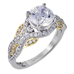 Presenting a dramatic contemporary design, this two-tone engagement ring is highlighted with .42 ctw of sparkling white diamonds.