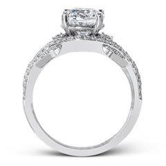 Presenting a dramatic contemporary design, this two-tone engagement ring is highlighted with .42 ctw of sparkling white diamonds.