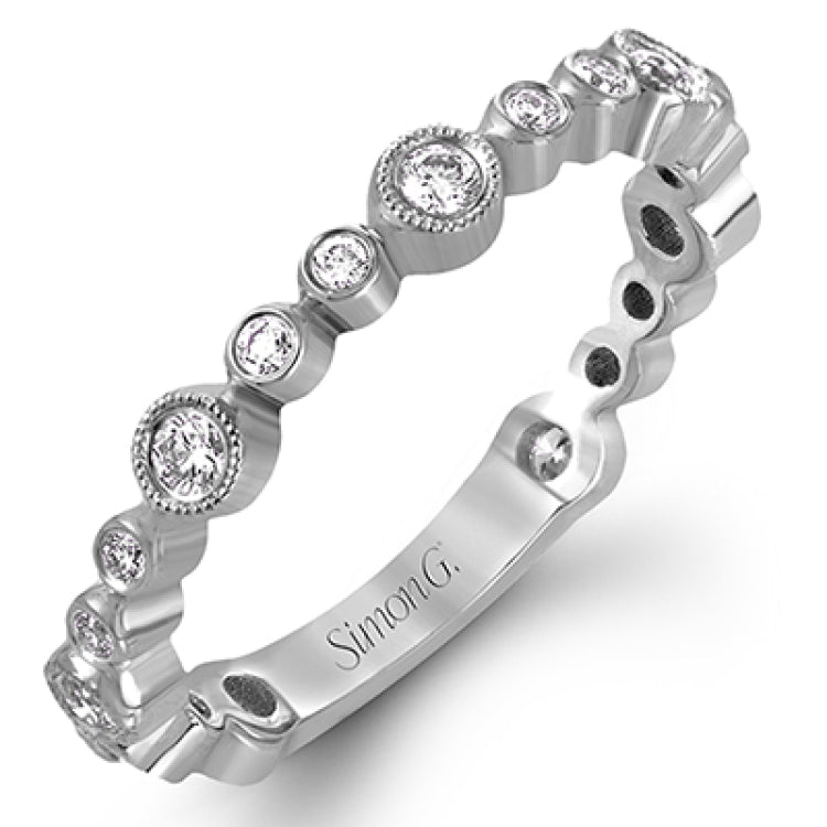 This wonderful stacking band can be worn with others or on its own. It has .30 ctw of multi-sized round white diamonds.