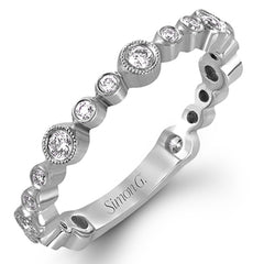 This wonderful stacking band can be worn with others or on its own. It has .30 ctw of multi-sized round white diamonds.