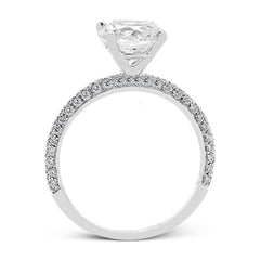 This absolutely exquisite white gold engagement ring dazzles the eye with round white diamonds.