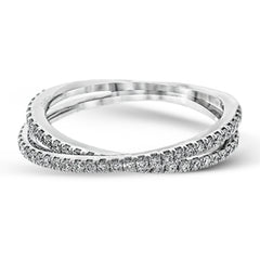 This absolutely exquisite white gold engagement ring dazzles the eye with round white diamonds.