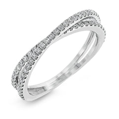 This absolutely exquisite white gold engagement ring dazzles the eye with round white diamonds.