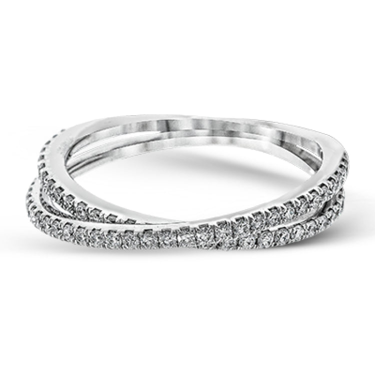 This absolutely exquisite white gold engagement ring dazzles the eye with round white diamonds.