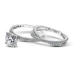 This absolutely exquisite white gold engagement ring dazzles the eye with round white diamonds.