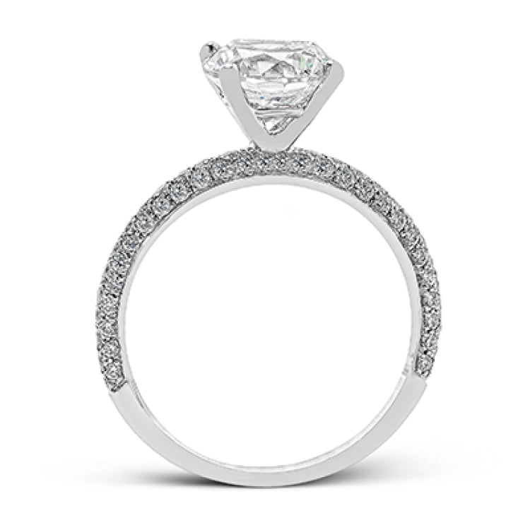 This absolutely exquisite white gold engagement ring dazzles the eye with round white diamonds.