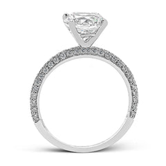 This absolutely exquisite white gold engagement ring dazzles the eye with round white diamonds.
