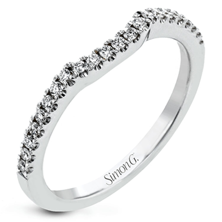 Featuring a brilliant halo setting, this contemporary white gold ring is set with 1.35 ctw glistening round cut white diamonds.