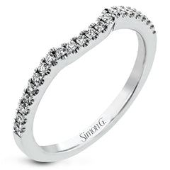 Featuring a brilliant halo setting, this contemporary white gold ring is set with 1.35 ctw glistening round cut white diamonds.
