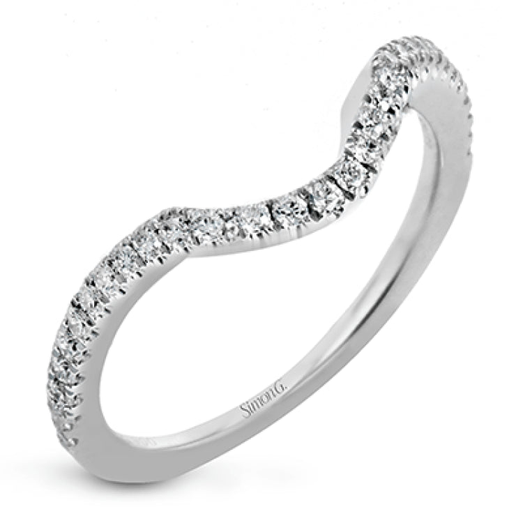 Featuring an exquisite contemporary design, this white gold engagement ring features an eye-catching oval double halo complemented by .68 ctw of round cut white diamonds.