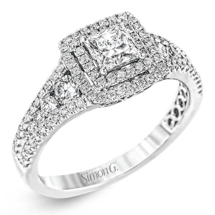 This lovely contemporary styled white gold engagement ring features a dazzling setting of .66 ctw of round cut white diamonds.
