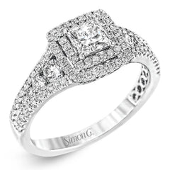 This lovely contemporary styled white gold engagement ring features a dazzling setting of .66 ctw of round cut white diamonds.