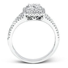 This lovely contemporary styled white gold engagement ring features a dazzling setting of .66 ctw of round cut white diamonds.