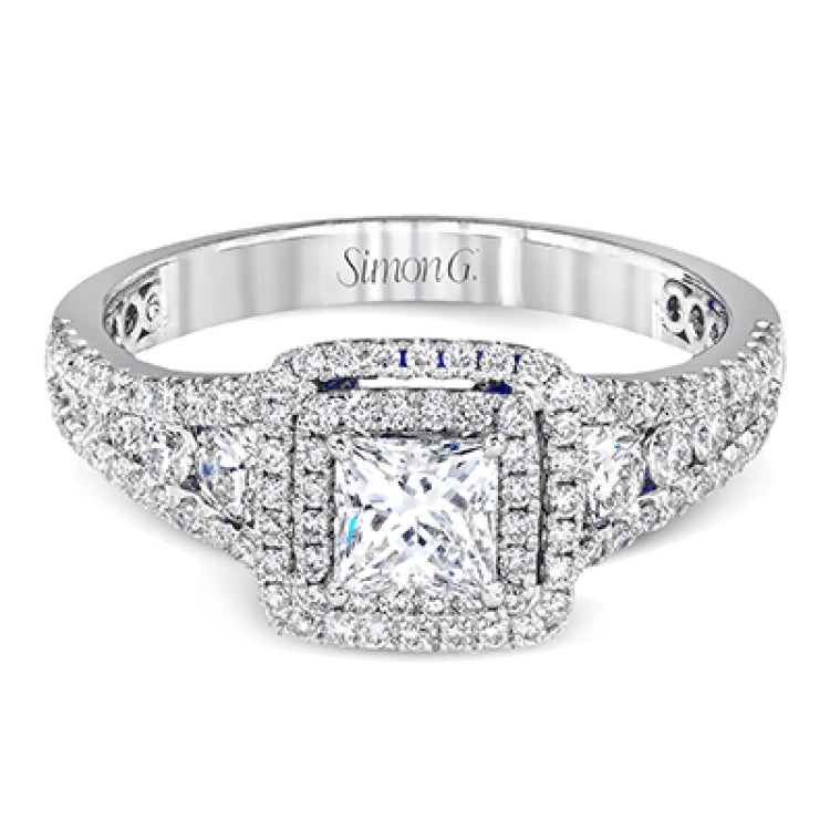 This lovely contemporary styled white gold engagement ring features a dazzling setting of .66 ctw of round cut white diamonds.