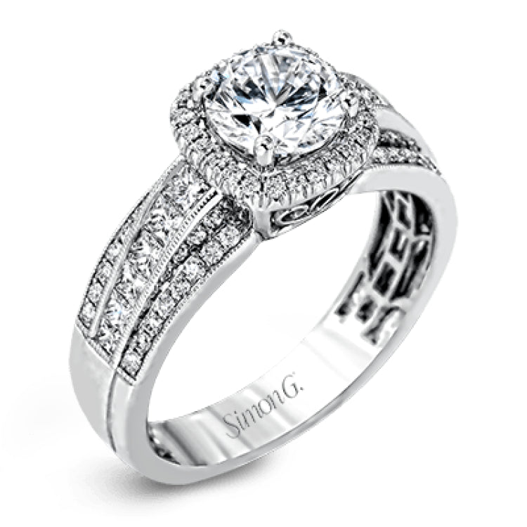 Featuring an impressive halo, this contemporary white gold engagement ring is accented by .22 ctw of round cut white diamonds and .42 ctw princess cut diamonds.