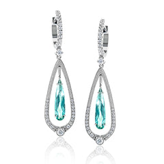 These gorgeous 18k white gold and diamond earrings recall the elegance of yesteryear with an teardrop design set with 2.83 ctw of green tourmalines in their midst.
