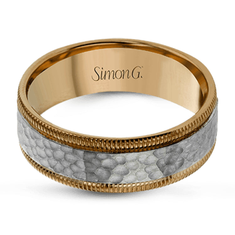 This stunning contemporary platinum men's wedding band features a hammered center column outlined dual milgrain edges for an eye-catching design.