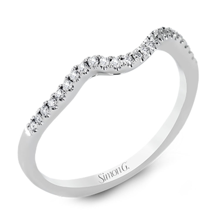 This distinctive, swirling ring design is set with .19 ctw and holds the center stone in a partial bezel setting.