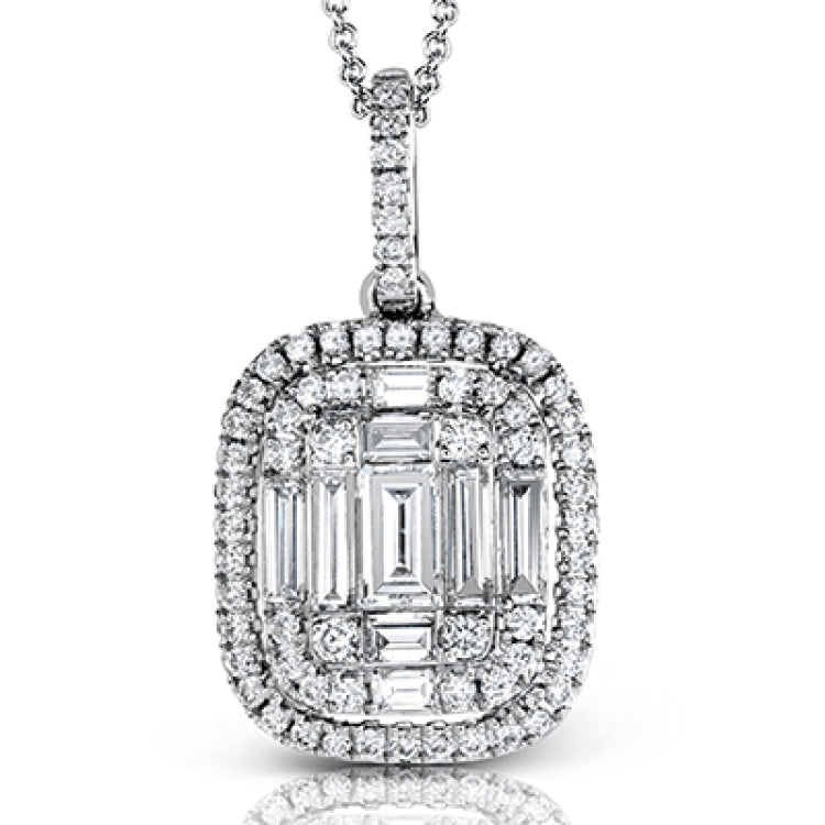 This impressive modern white gold pendant is highlighted by .19 ctw round cut white diamonds and accented with .38 ctw baguette cut diamonds.