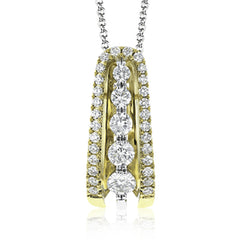 Presenting a dramatic contemporary design, this white gold pendant is accentuated by .60 ctw of round cut diamonds in graduated sizes.