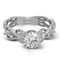 This impressive contemporary two-tone engagement ring features a unique twisting design on the shank, which is complemented by .17 ctw of round cut white diamonds.