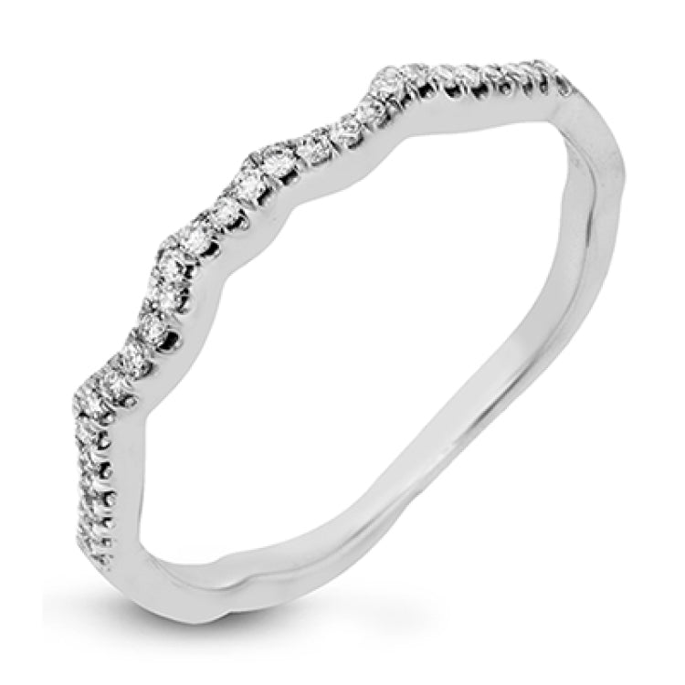 This impressive contemporary two-tone engagement ring features a unique twisting design on the shank, which is complemented by .17 ctw of round cut white diamonds.