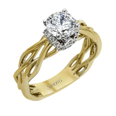 The distinctive twist design on the shank of this two-tone ring sets the stage for a sparkling setting of .13 ctw of round cut white diamonds.