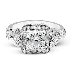The lovely vintage design of this impressive white gold ring is emphasized by .27 ctw sparkling round cut white diamonds.
