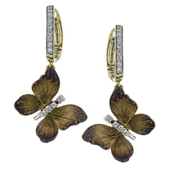 Two lovely golden butterflies are suspended beneath .19 ctw of diamonds, making these remarkable earrings truly memorable.