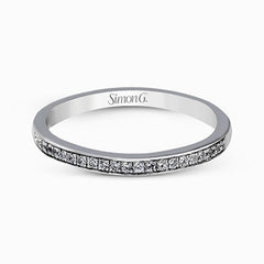 Showcasing a dazzling halo, this contemporary white gold wedding set is highlighted by .45 ctw of arresting round cut white diamonds.