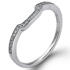 This romantic white gold engagement ring is complemented by .57 ctw of sparkling round cut white diamonds in a vintage-inspired setting.