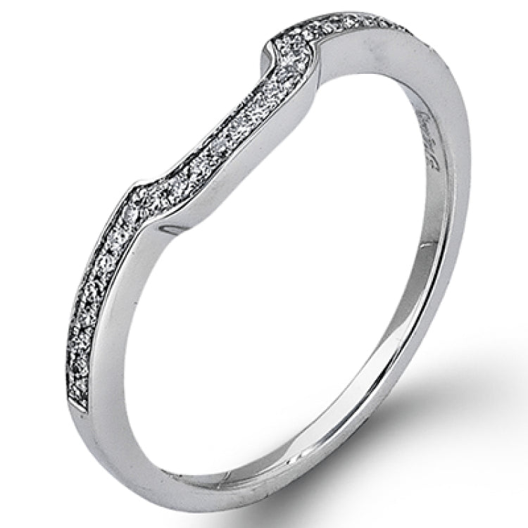 This romantic white gold engagement ring is complemented by .57 ctw of sparkling round cut white diamonds in a vintage-inspired setting.