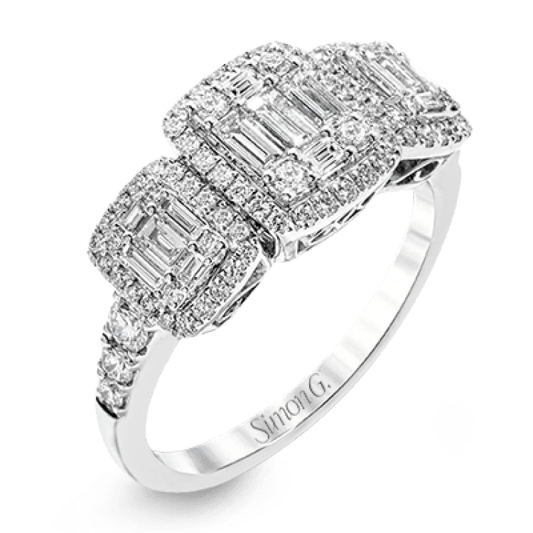 This amazing vintage-inspired ring features three halos and contains .52 ctw of round brilliant diamonds and .41 ctw of baguette diamonds.