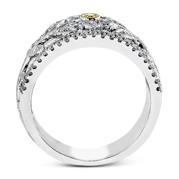 The delicate floral design of this white and yellow gold band is complemented by .53 ctw of round cut white diamonds and .04 ctw of round cut yellow diamond accents.