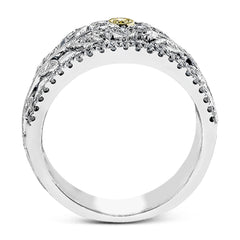 The delicate floral design of this white and yellow gold band is complemented by .53 ctw of round cut white diamonds and .04 ctw of round cut yellow diamond accents.