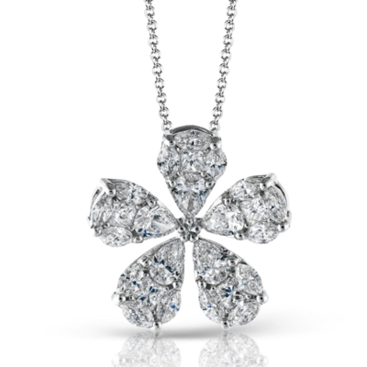 The elegant floral design of this white gold pendant is accentuated by a five petal design with .15 ctw of princess cut diamonds, .48 ctw pear shaped diamonds and .42 ctw marquise cut diamonds.
