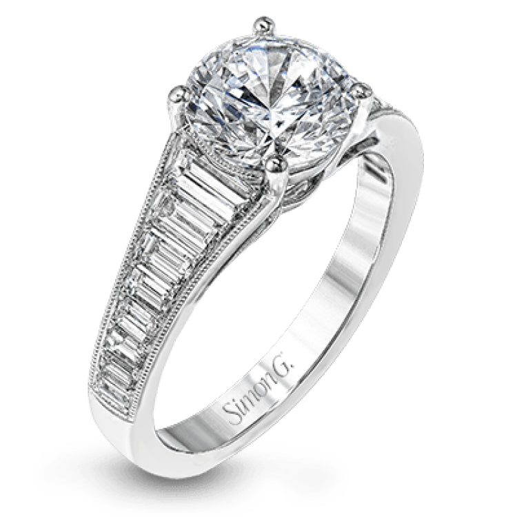 Baguette diamonds increasing in size lead the way to the center of this gorgeous engagement ring design. The outside edge is decorated with delicate milgrain, and this ring contains .98 ctw of side diamonds.
