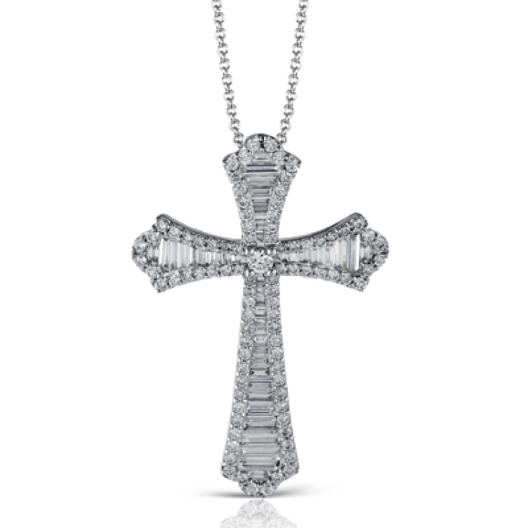 This striking white gold cross pendant is accented by the presence of .40 ctw round white diamonds and .56 ctw baguette cut diamonds.
