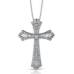This striking white gold cross pendant is accented by the presence of .40 ctw round white diamonds and .56 ctw baguette cut diamonds.