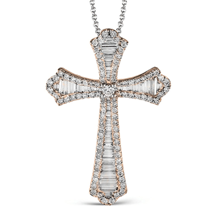 This striking white gold cross pendant is accented by the presence of .40 ctw round white diamonds and .56 ctw baguette cut diamonds.