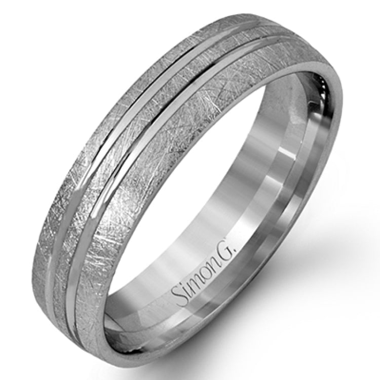 This men's band has a contemporary feel and a lived-in texture with one line of rose gold in the middle surrounded by white gold.