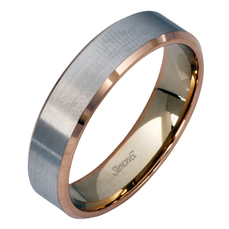 A distinctive combination of white gold combined with a rose gold silhouette creates an impressive design for this men's wedding band.