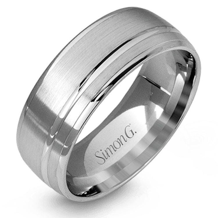 This statement men's wedding band features an accent of 14k rose gold within a 14k white gold background.
